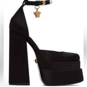 Versace platforms Black size 6.5 I bought two pairs and the others fit better!